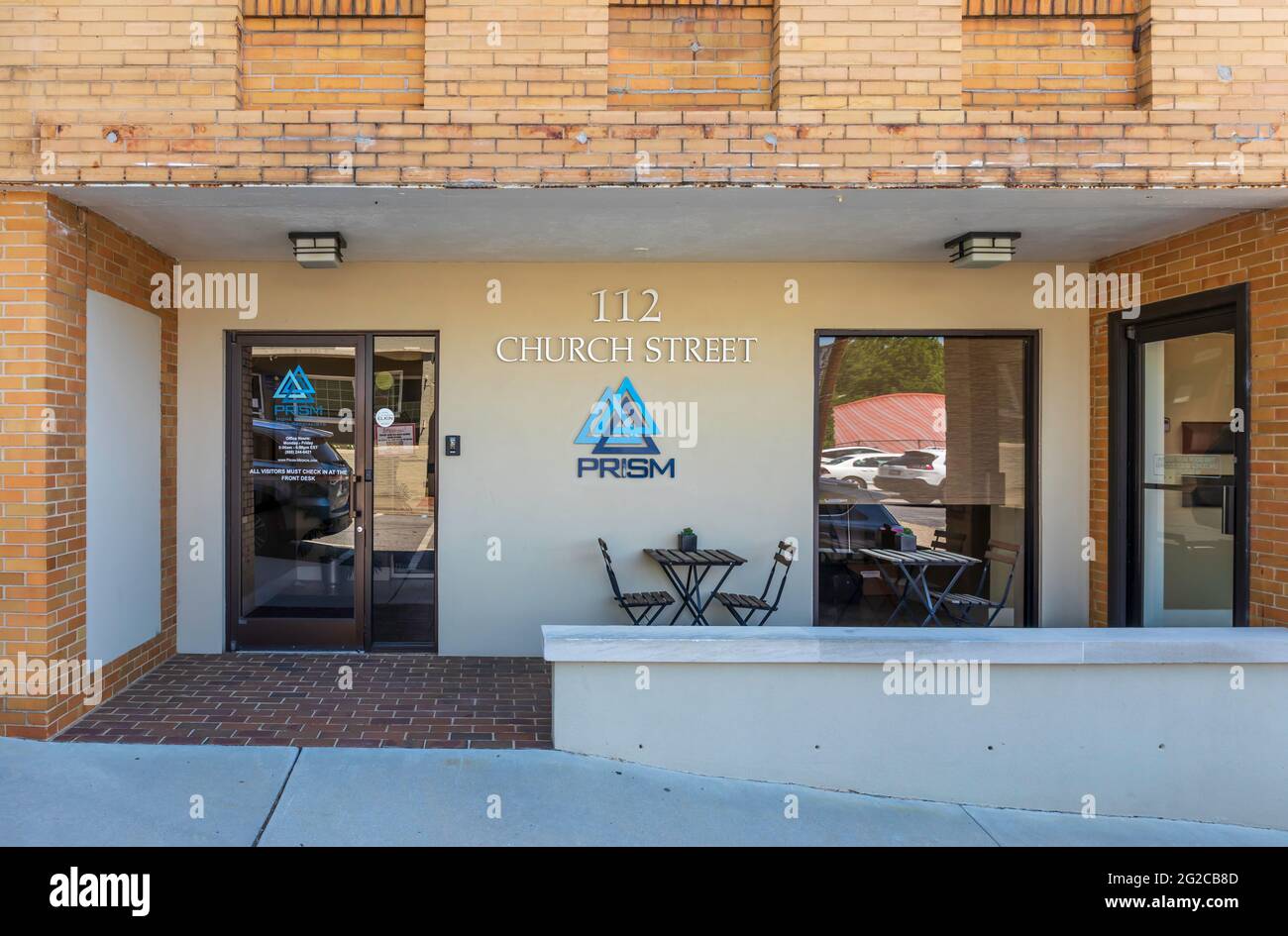 ELKIN, NC, USA-5 JUNE 2021:   Offices of Prism, a comprehensive medical supplies business, with home delivery.  Facade and entrance doors. Stock Photo