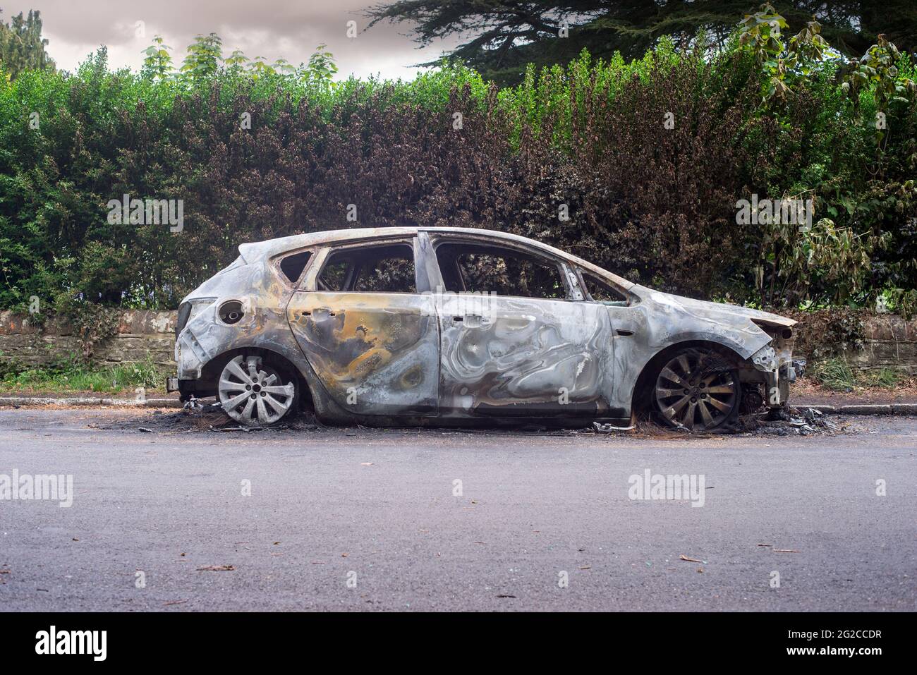 A burnt out Vauxhall Astra car abandoned in Cemetery Road in Southampton Stock Photo