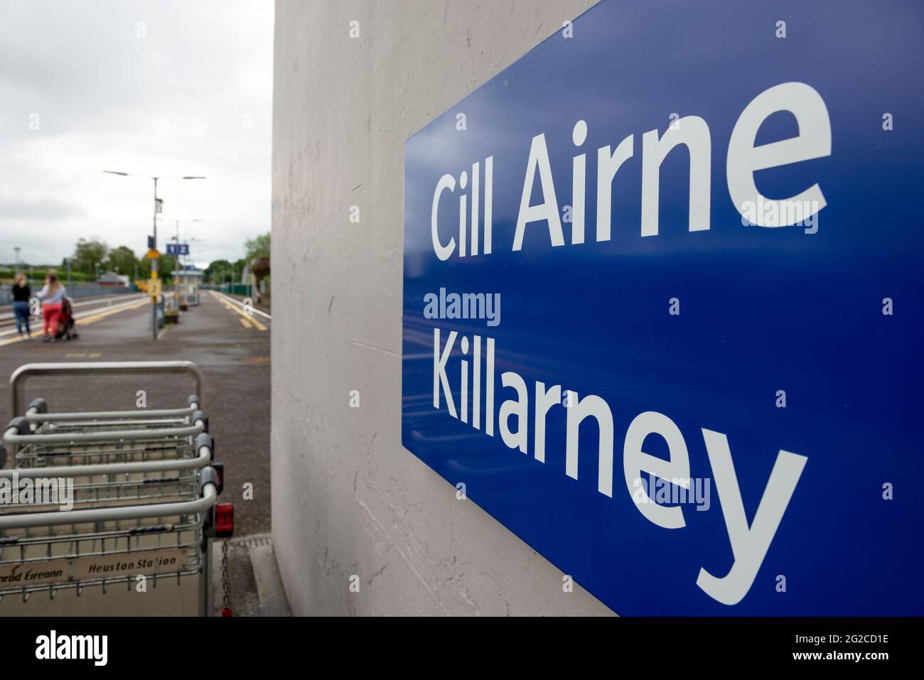 Bilingual sign for the Killarney train station in Killarney, County Kerry, Ireland Stock Photo