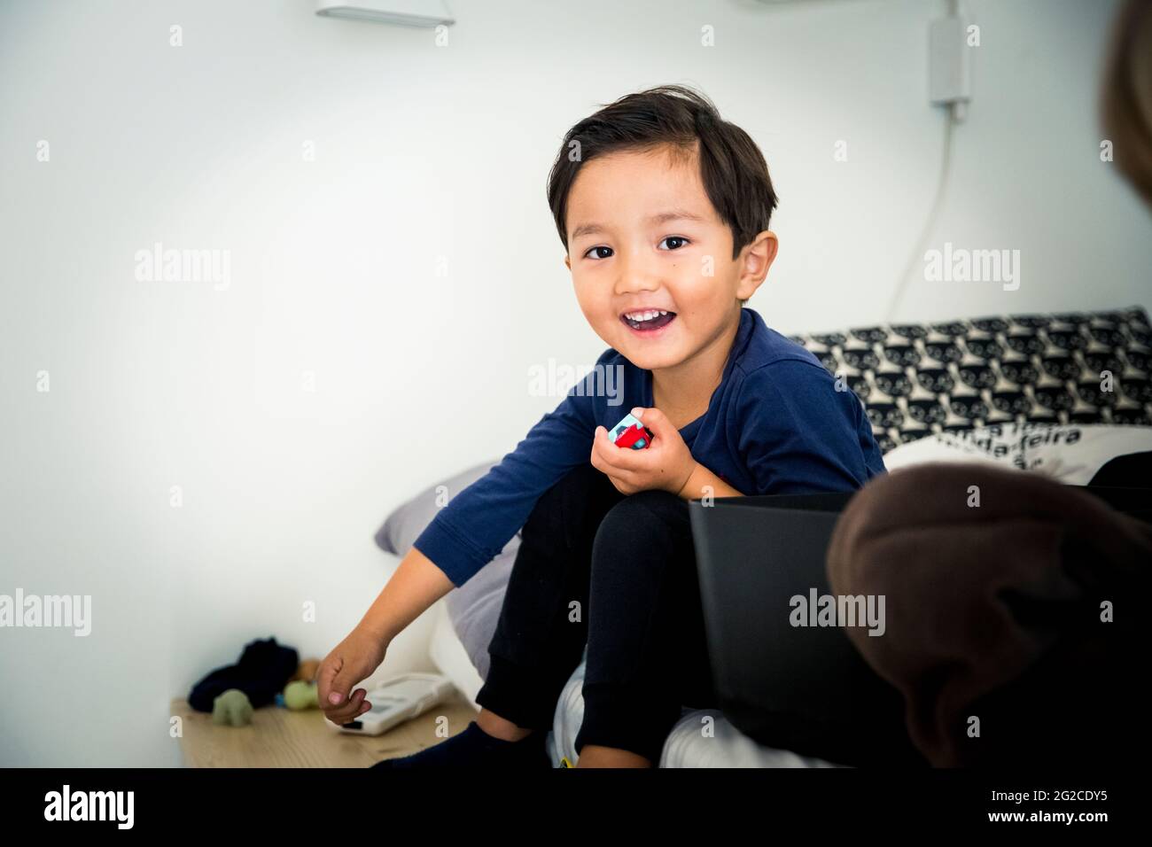Smiling boy looking at camera Stock Photo - Alamy