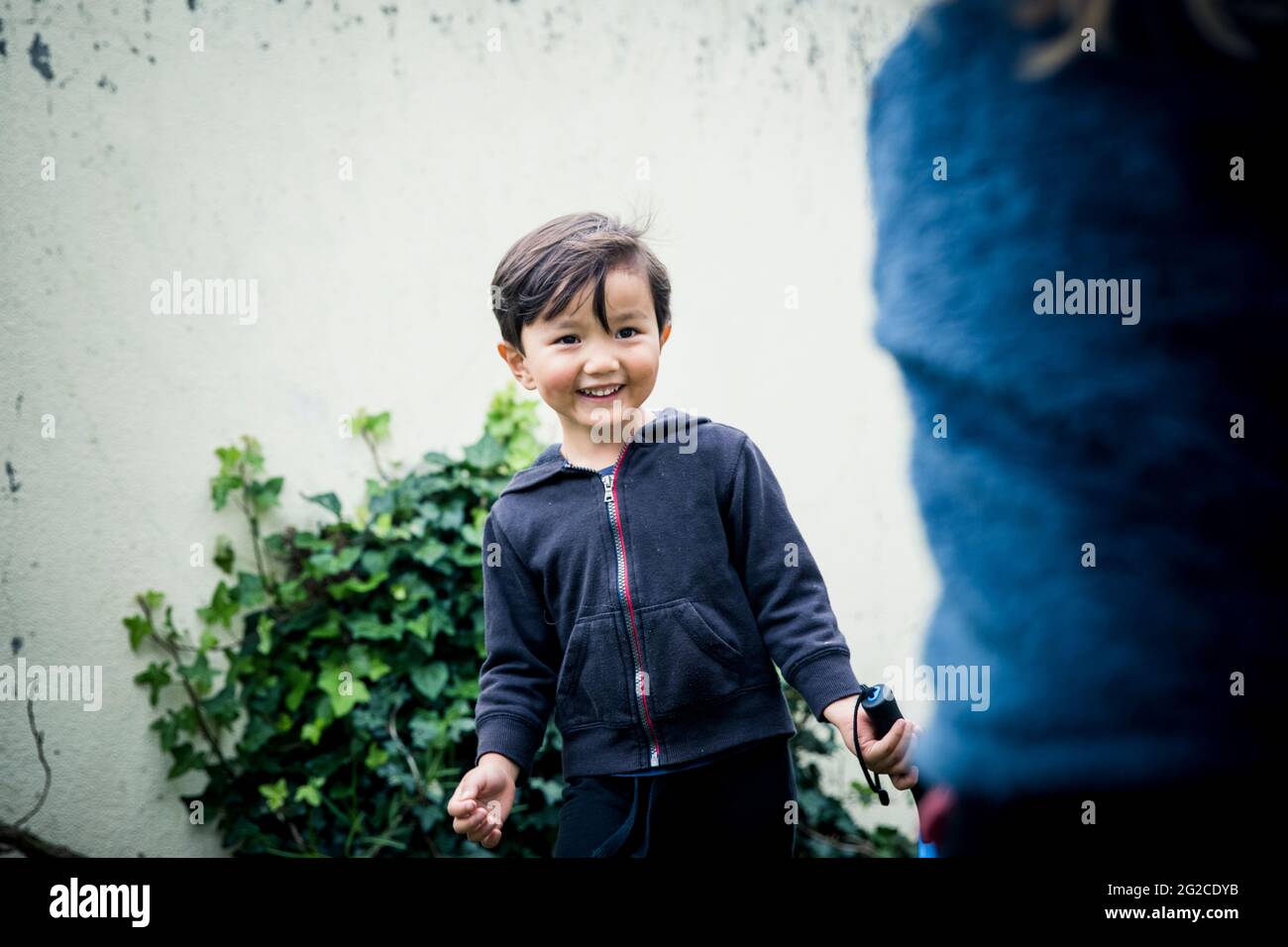 Smiling boy looking away Stock Photo
