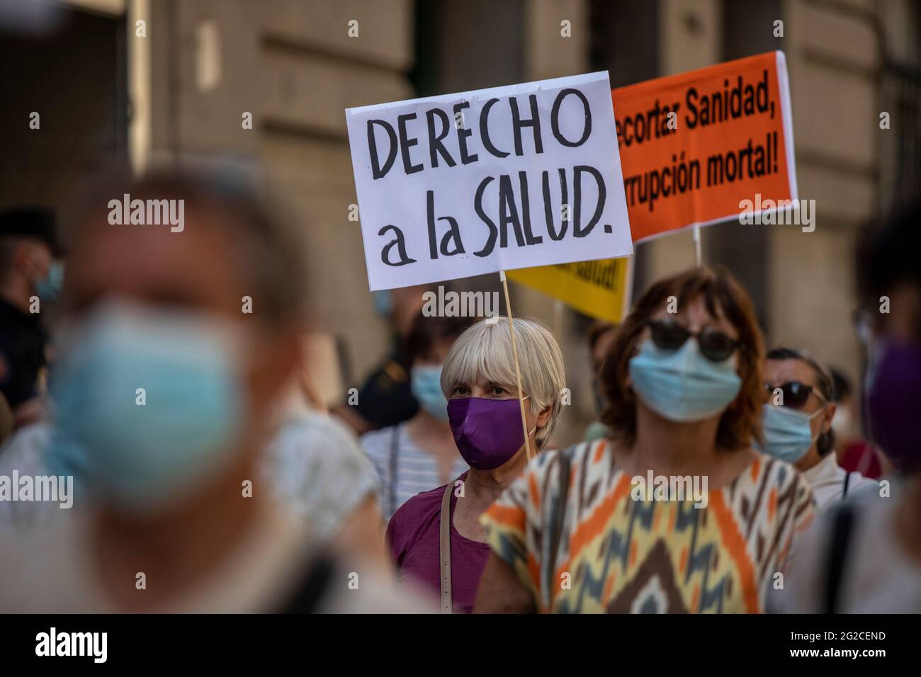 Madrid, Spain. 10th June, 2021. Protesters marching with placards expressing their opinion during the demonstration.A group of protesters gathered outside the Ministry of Health to demonstrate against the closures of health centres and primary care services. (Photo by Guillermo Gutierrez Carrascal/SOPA Images/Sipa USA) Credit: Sipa USA/Alamy Live News Stock Photo
