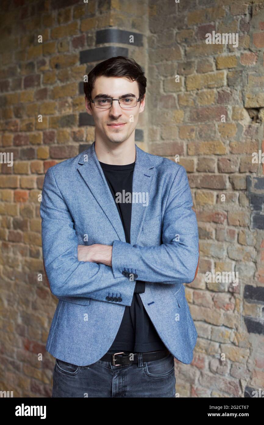 Portrait of young confident man Stock Photo