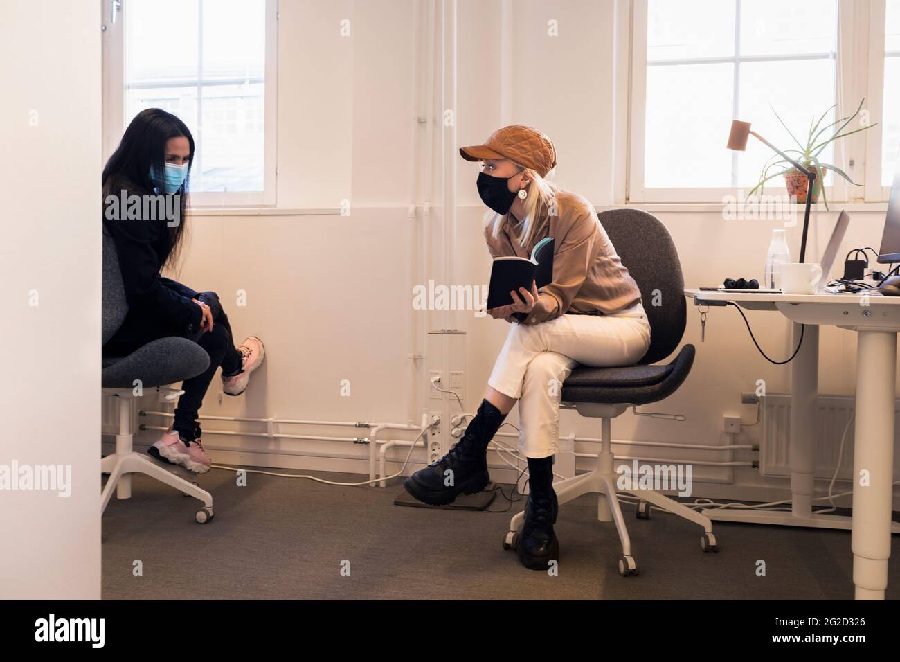 Women in face masks hi-res stock photography and images - Alamy