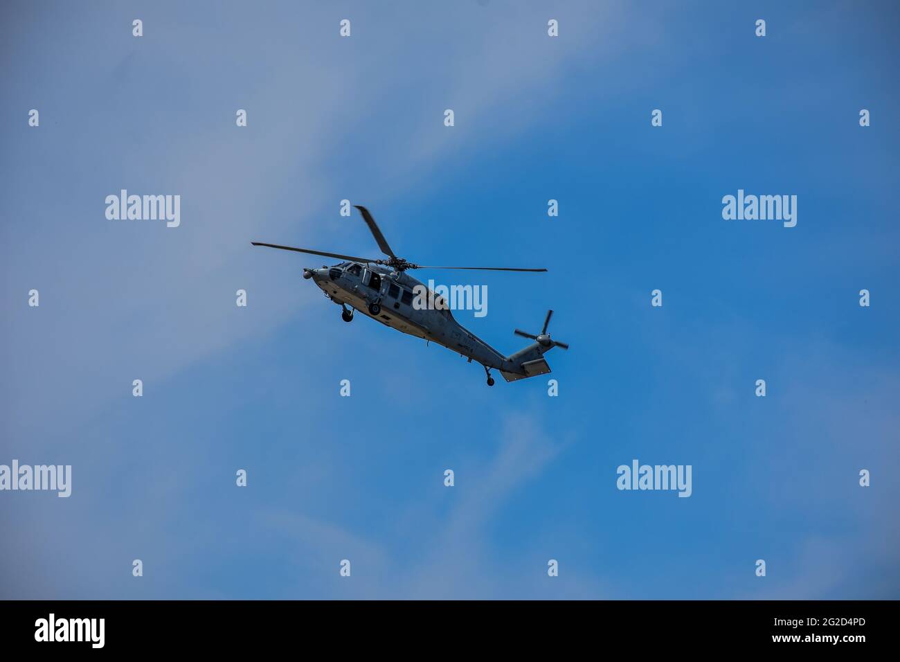 A U.S. Navy Helicopter flying over the coast of North Carolina. Stock Photo