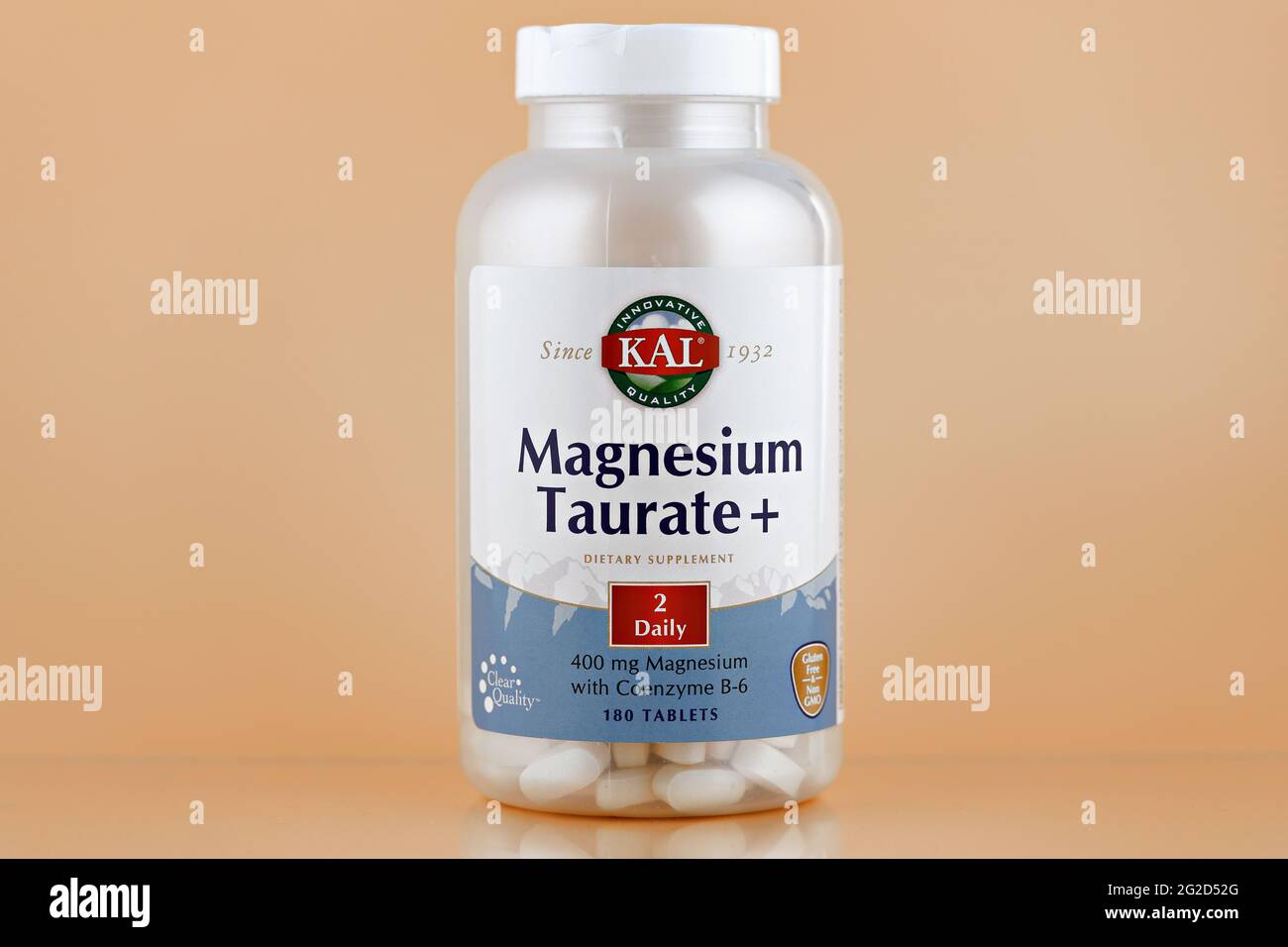 magnesium taurate tablets in the jar. dietary supplement editorial