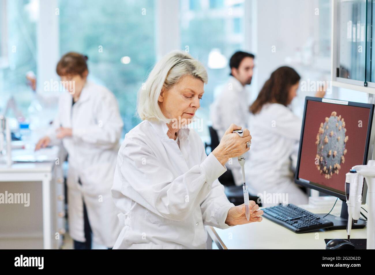 Woman working in laboratory Stock Photo