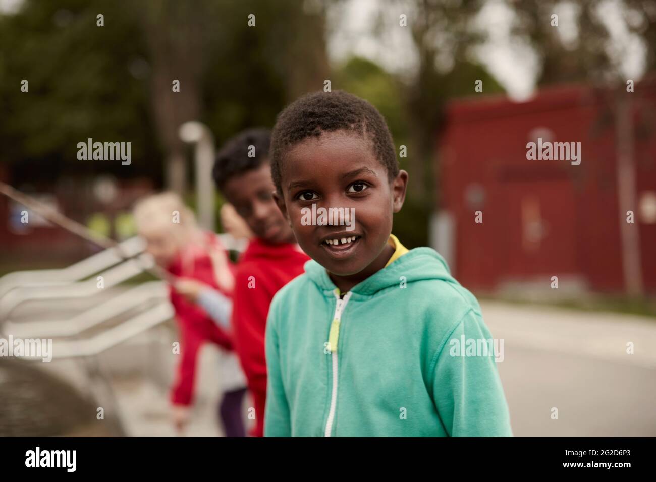 Boy looking into camera hi-res stock photography and images - Alamy