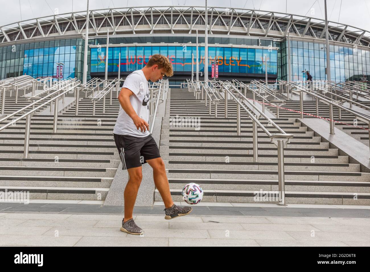 Wembley Stadium, Wembley Park, UK. 10th June 2021.   Euro 2020 ambassador, Scott Penders, showing his football skills outside Wembley Stadium, ahead of the start of the UEFA European Football Championship tomorrow.  Scott will be performing on the pitch at all Wembley matches.  Postponed by a year as the Coronavirus pandemic hit worldwide in 2020, the tournament starts on 11th June 2021, with Wembley Stadium hosting it's first match, England v Croatia, on 13th June 2021.   Amanda Rose/Alamy Live News Stock Photo