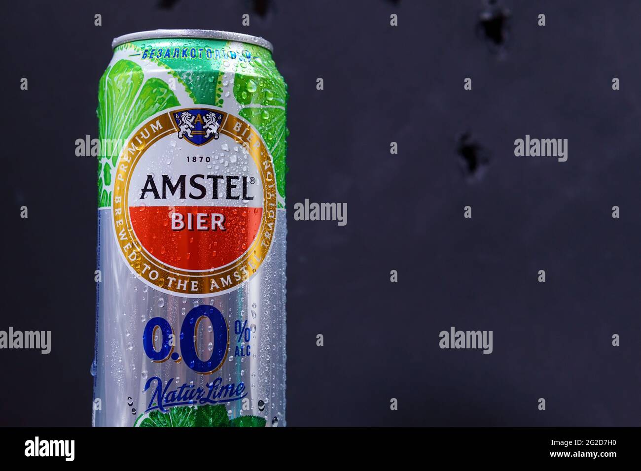 Tyumen, Russia-May 25, 2021: Amstel beer can non-alcoholic with lime and mint. Dark background Stock Photo