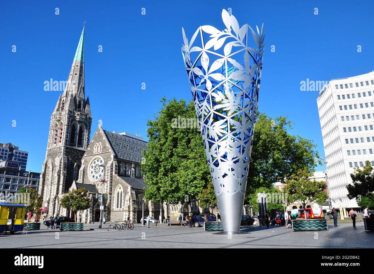 Christchurch, New Zealand - NOV 26, 2010: Chalice sculpture by Neil Dawson and Christchurch Anglican cathedral in in Cathedral Square Stock Photo