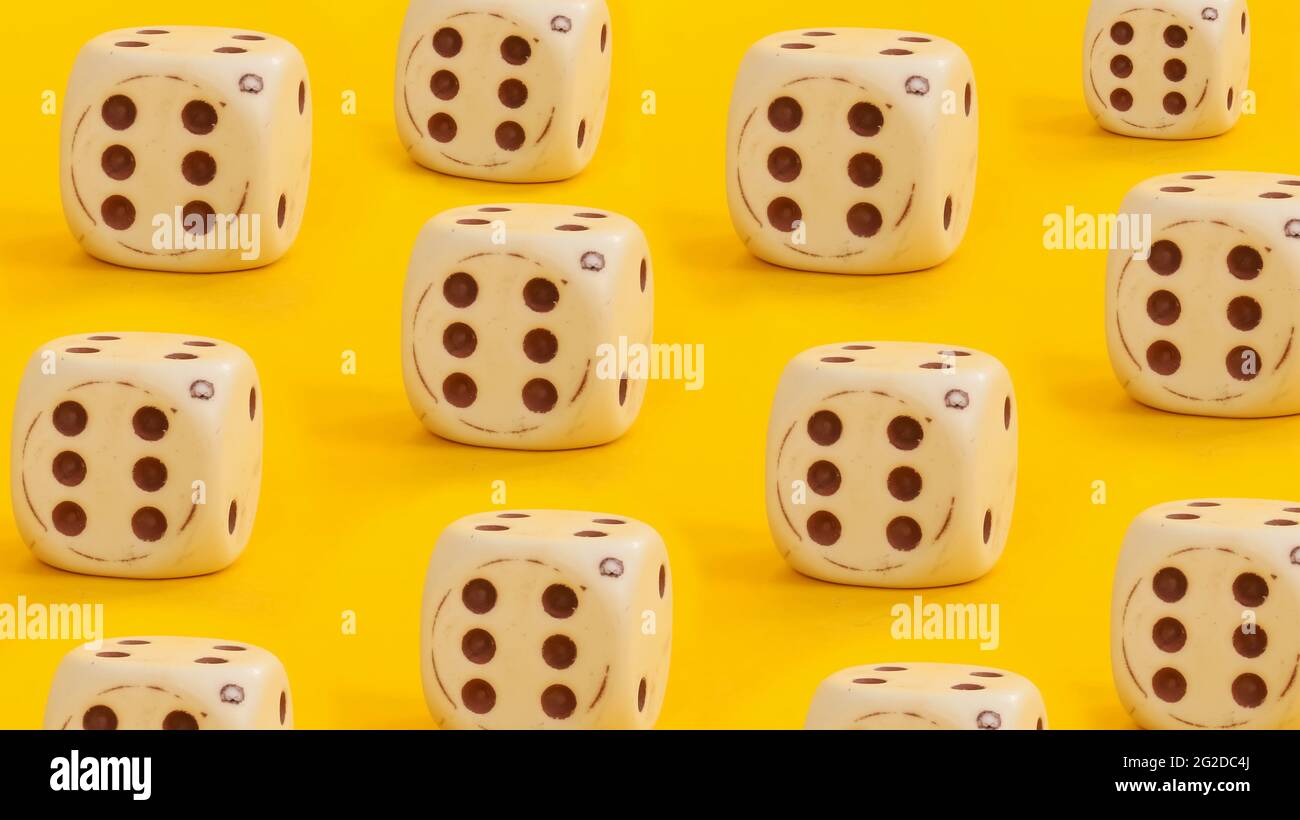 White dices, white dices pattern background, isolated on yellow background. Stock Photo