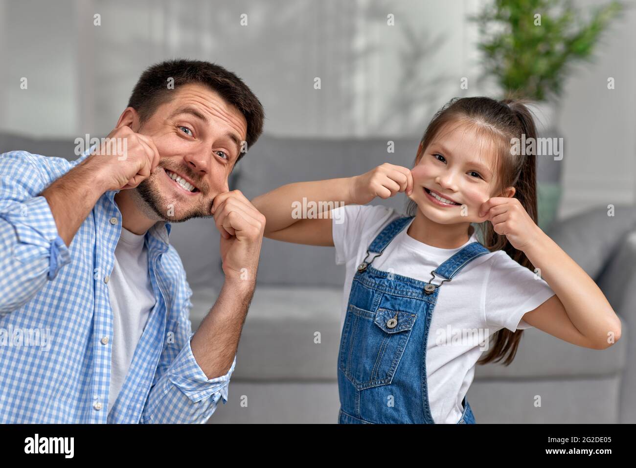 happy father and his cute little child daughter having fun Stock Photo ...