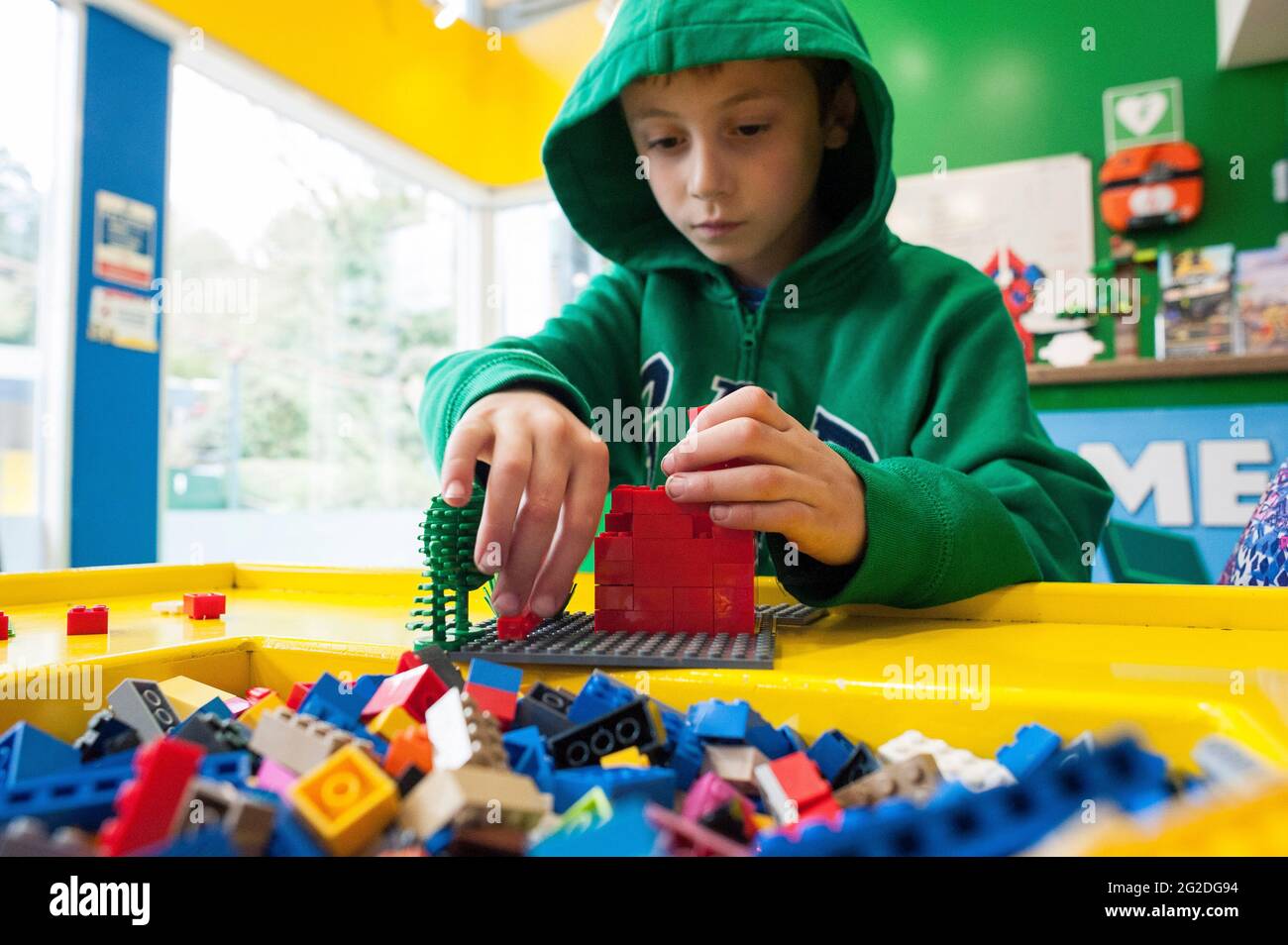 Kids playing with lego toys Stock Photo