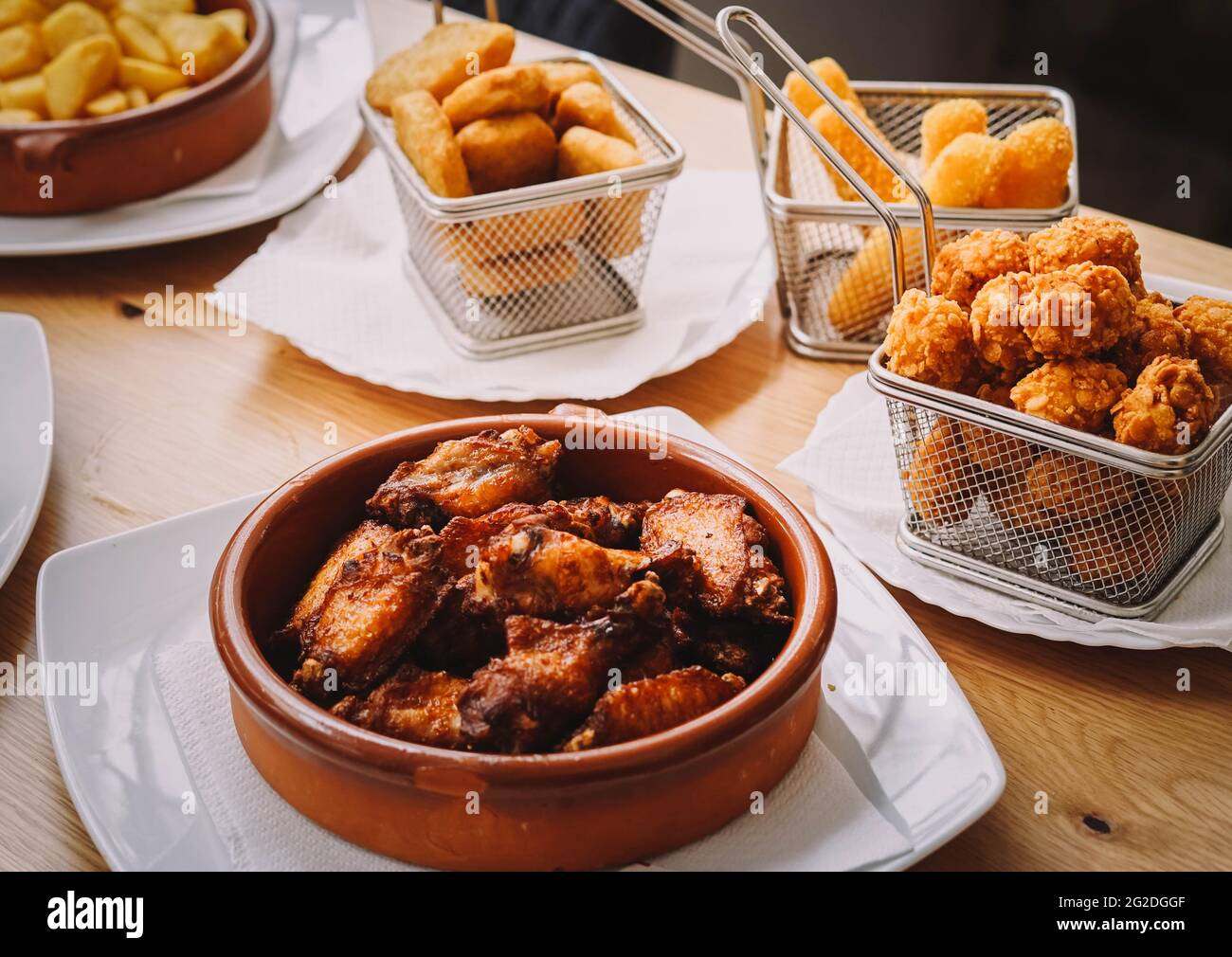 A serving of chicken wings in a tapas bar Stock Photo Alamy