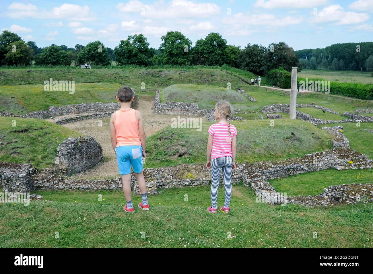 Kid looking at the roman ruins in St Albans, England Stock Photo