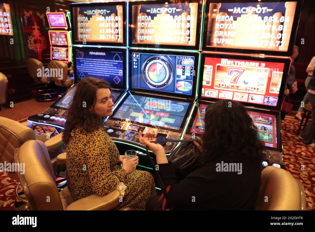 KYIV, UKRAINE - JUNE 10, 2021 - Women sit at the slot machines in the Billionaire  Casino in a hotel, Kyiv, capital of Ukraine Stock Photo - Alamy