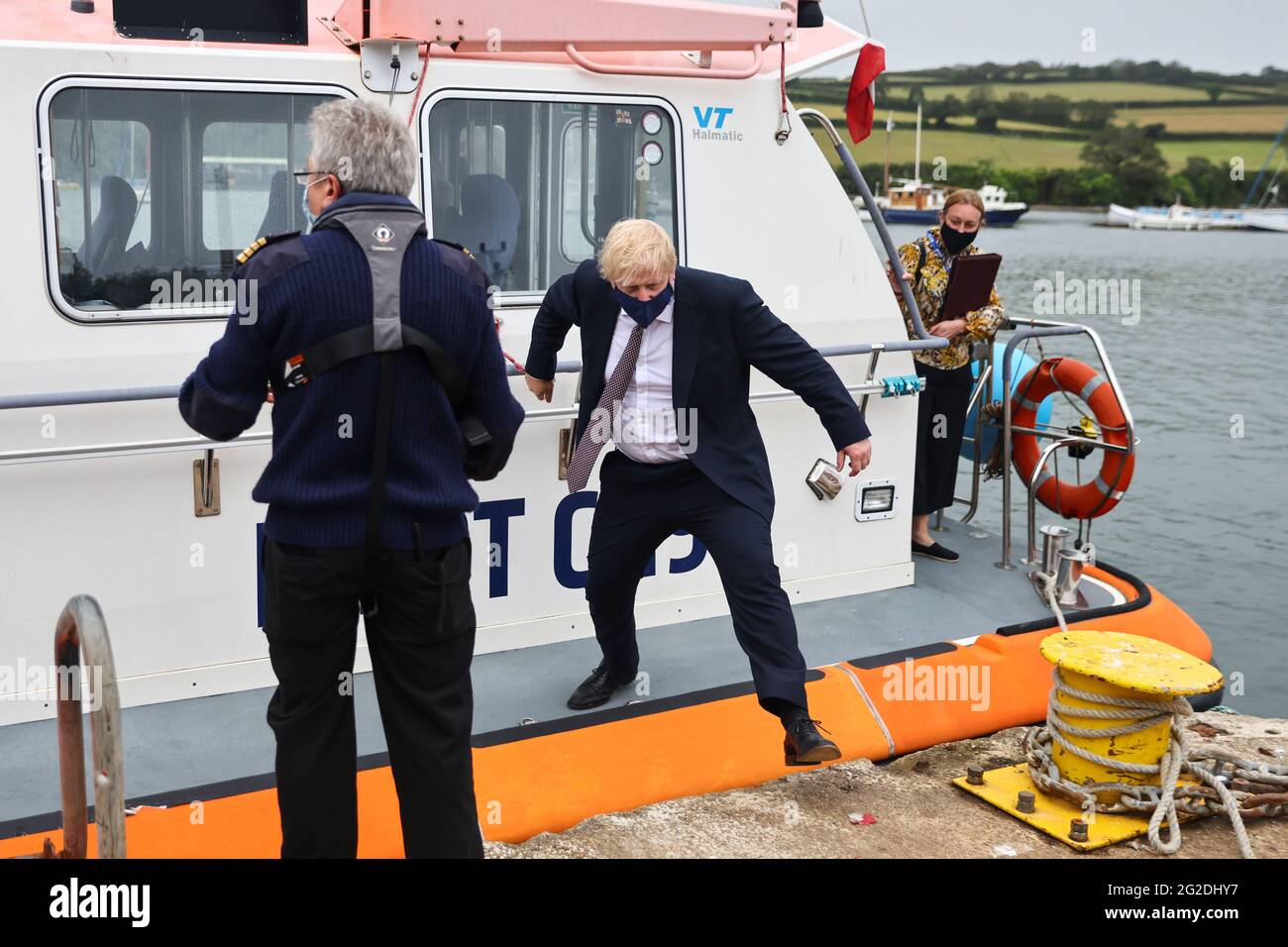 Prime Minister Boris Johnson arrives by boat for a visit to the ...