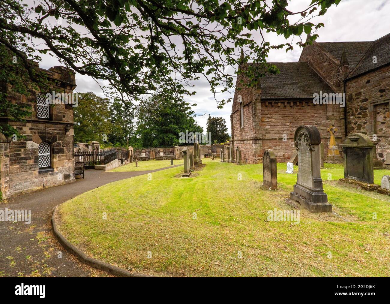 Duddingston Kirk and Graveyard which dates back to the 12 Century and one of the oldest churches t in Edinburgh, Edinburgh, Scotland, UK Stock Photo