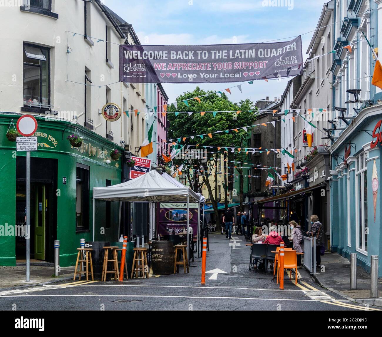 Outdoor dining in the Latin Quarter in Galway City, Ireland. A medieval part of the city, Traffic is now excluded to encourage outdoor hospitality. Stock Photo
