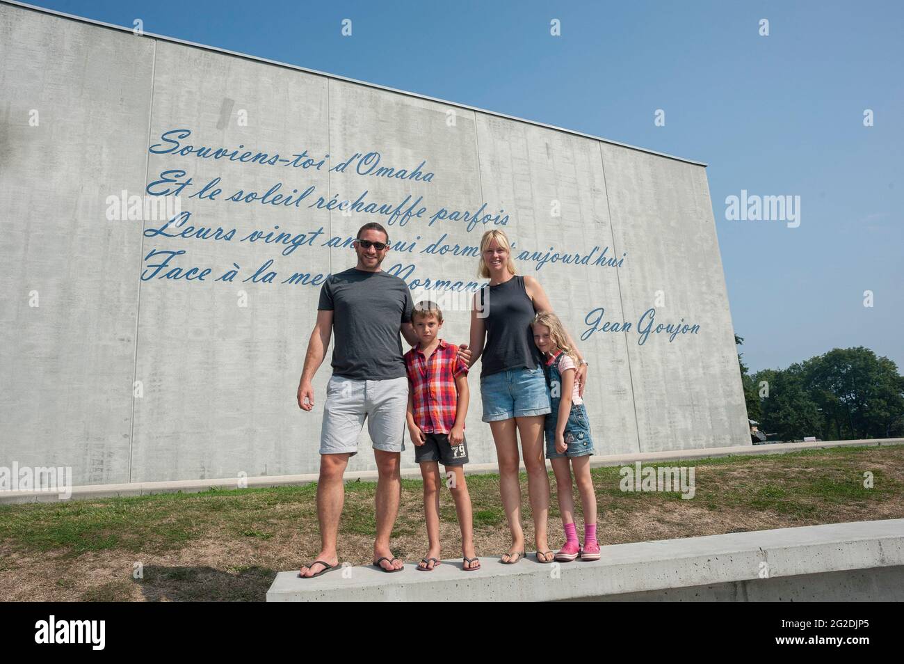 A family exploring the D Day sights of Normandy and learning about the history. Stock Photo
