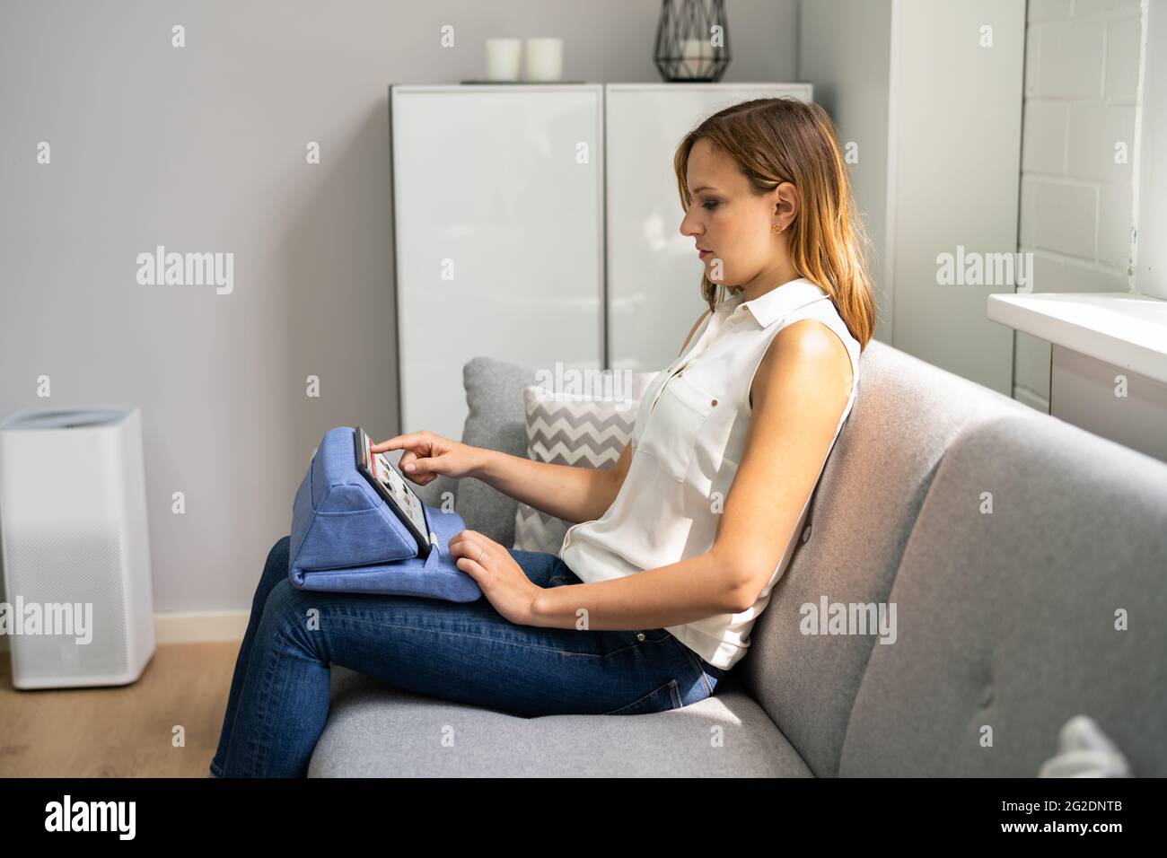 Woman Avoiding Neck Pain Sitting With Good Posture Stock Photo