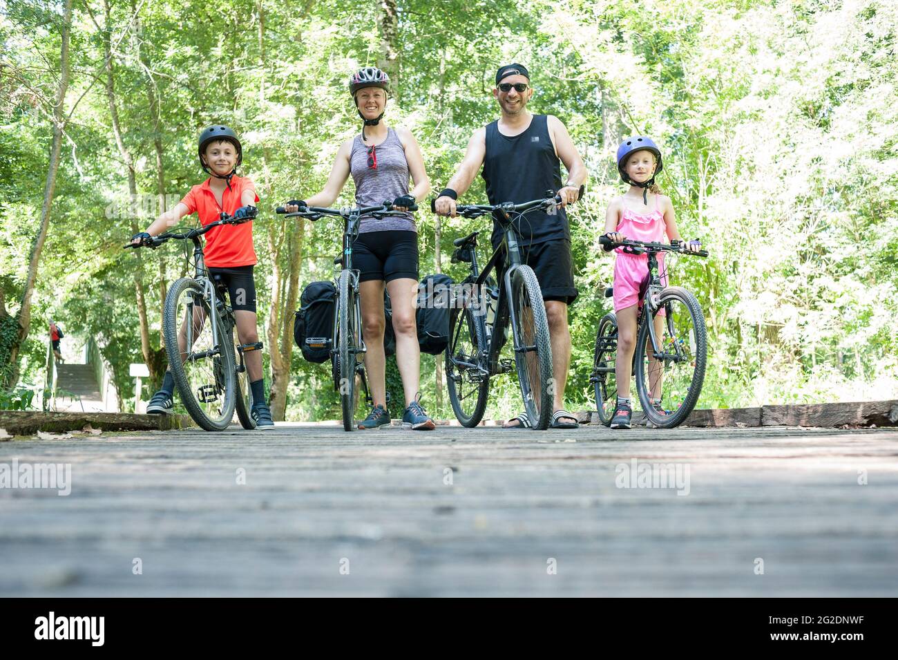 A family cycle through nature in rural france and explore the landscape ...