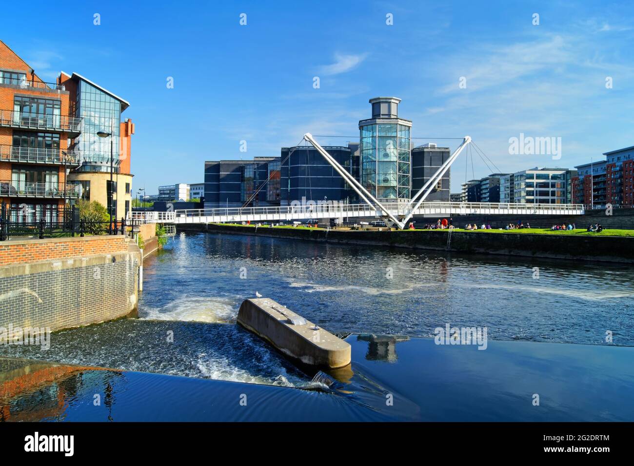 UK, West Yorkshire, Royal Armouries Museum, Leeds Dock, River Aire and Knights Way Bridge from Merchants Quay. Stock Photo