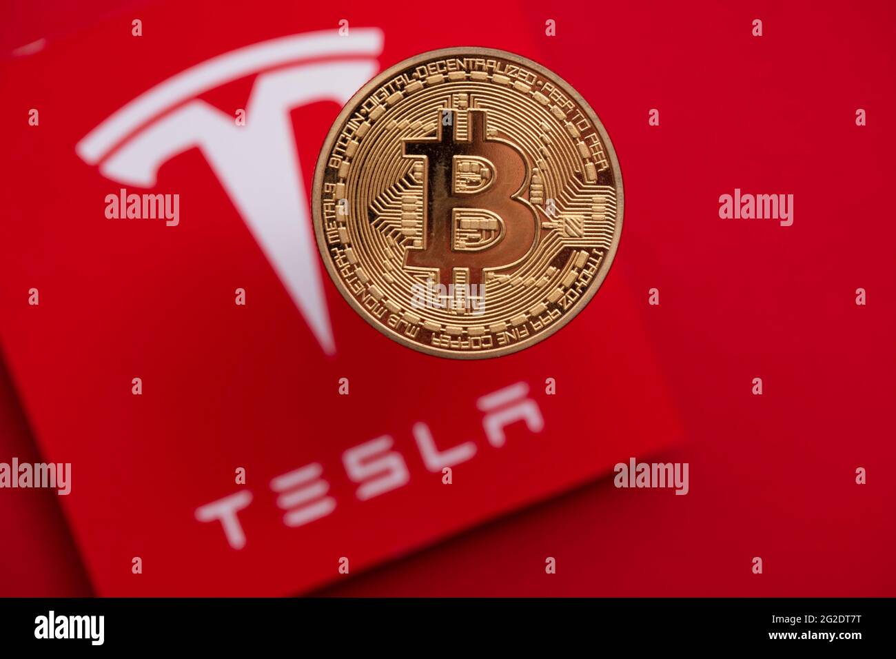 LONDON, UK - June 2021: Bitcoin cryptocurrency on a Tesla electric vehicle  logo Stock Photo - Alamy