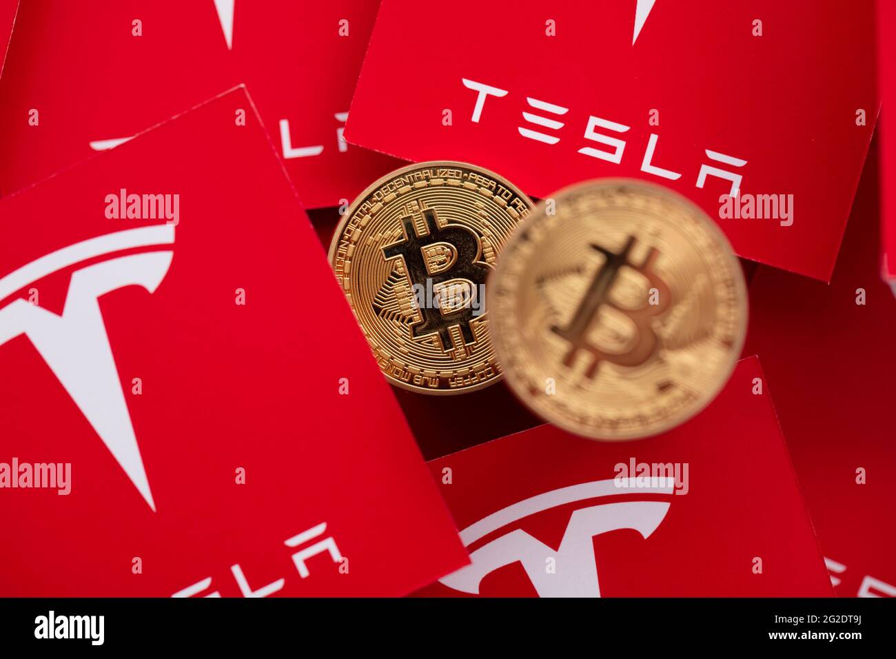 LONDON, UK - June 2021: Bitcoin cryptocurrency on a Tesla electric vehicle  logo Stock Photo - Alamy