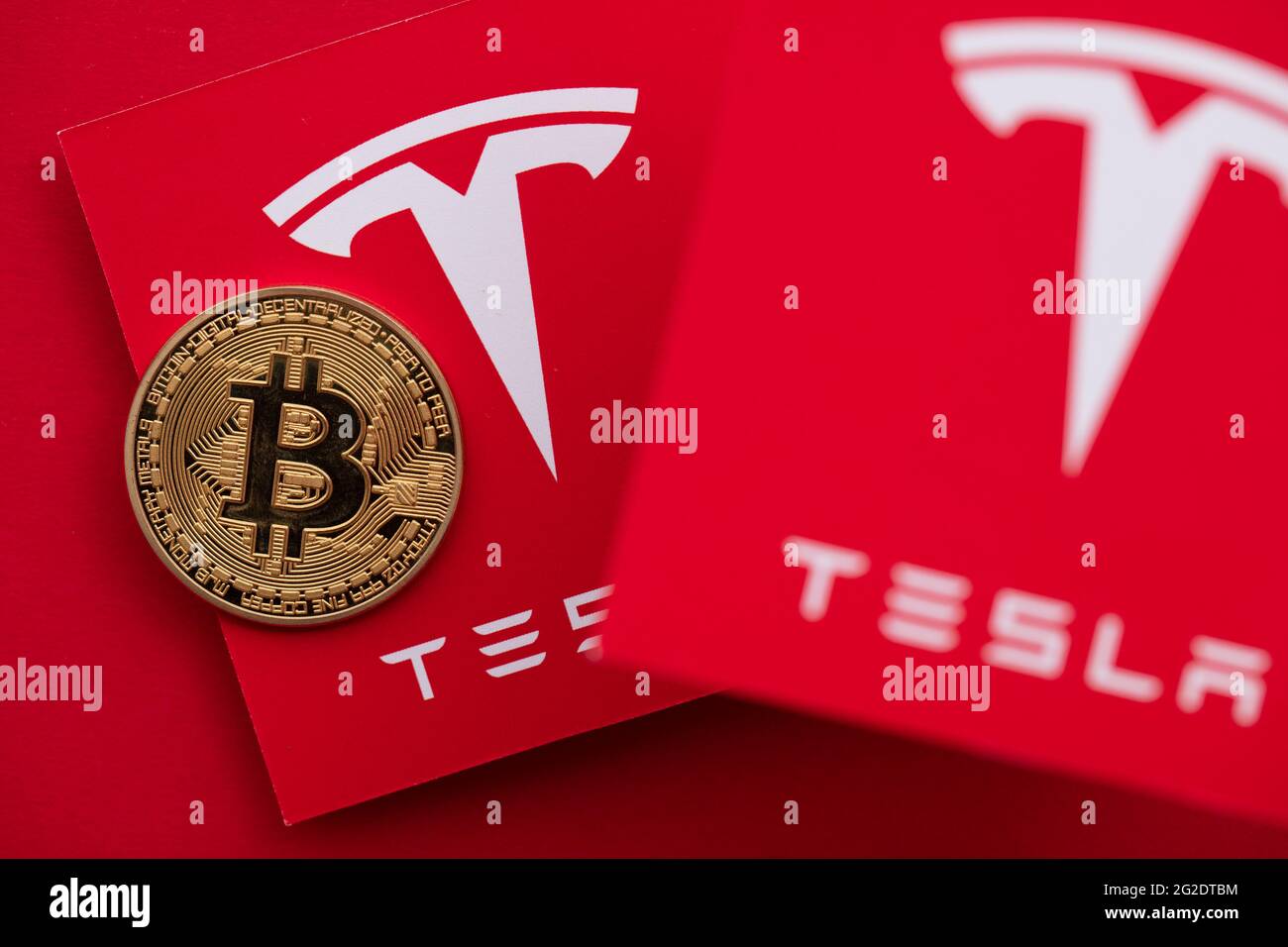 LONDON, UK - June 2021: Bitcoin cryptocurrency on a Tesla electric vehicle  logo Stock Photo - Alamy