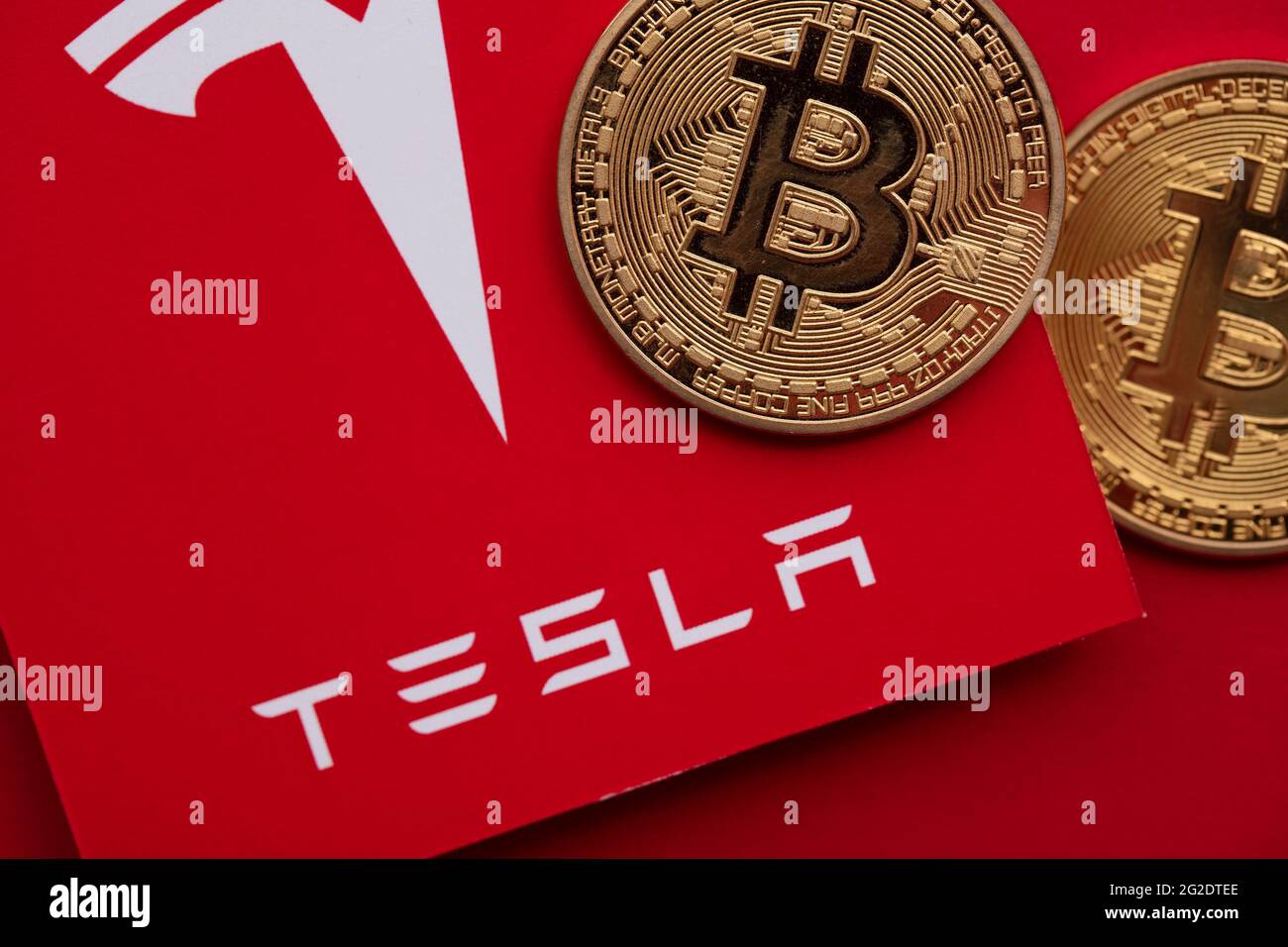 LONDON, UK June 2021 Bitcoin cryptocurrency on a Tesla electric