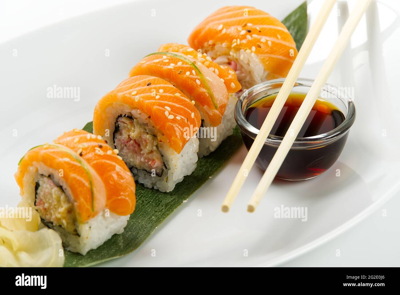 Premium Photo  Fresh made sushi roll set with soy sauce, sesame
