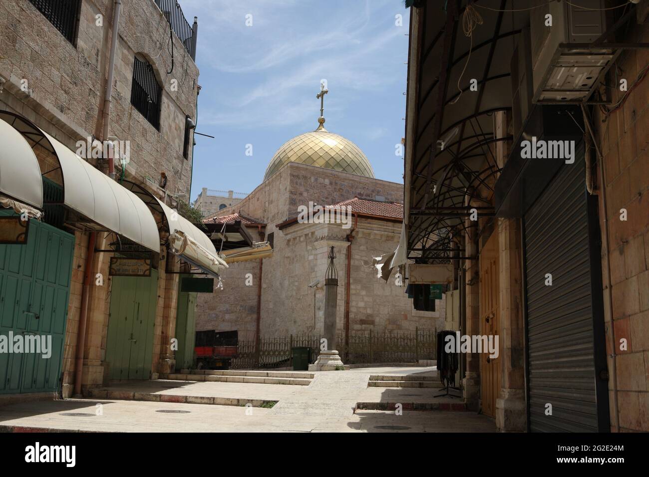 Greek Orthodox Church, building exterior and dome of Saint John the Baptist in the empty Muristan because of Covid 19, the Old City Christian Quarter Stock Photo