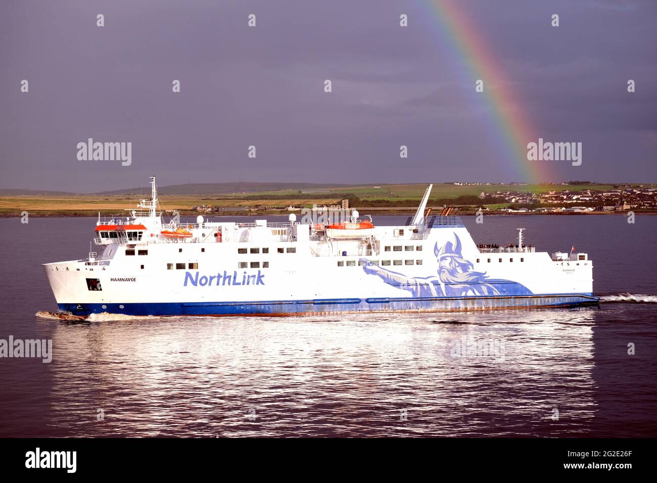 UNITED KINGDOM; SCOTLAND; RAINBOW OVER THE NORTHLINK FERRY 'HAMNAVOE' EN ROUTE TO THE ORKNEY ISLANDS FROM SCRABSTER Stock Photo