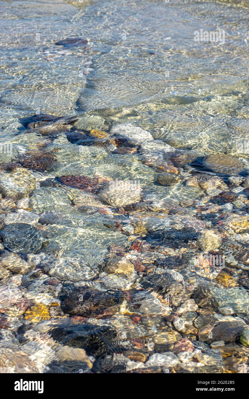 Abstract Background Texture, Colorful Sea Stones in Water, Top View Stock Photo