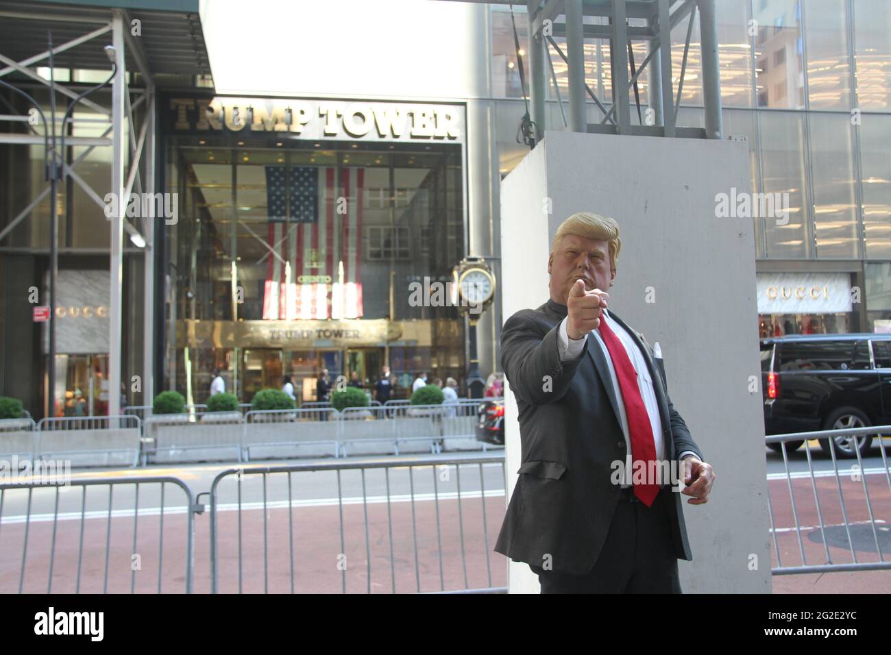 New York, USA. 10th June, 2021. (NEW) Donald Trump Look Alike Entertains Public at Trump Tower. June 10, 2021, New York, USA: Neil Harbinsson, who dresses up like former US President, Donald Trump, entertains people in front of Trump Tower on 5th Avenue, New York. He walks around, controls vehicle traffic and takes pictures with people.Credit: Niyi Fote/TheNews2 Credit: Niyi Fote/TheNEWS2/ZUMA Wire/Alamy Live News Stock Photo