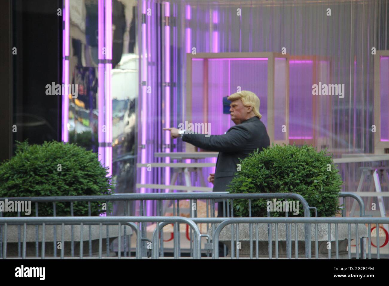 New York, USA. 10th June, 2021. (NEW) Donald Trump Look Alike Entertains Public at Trump Tower. June 10, 2021, New York, USA: Neil Harbinsson, who dresses up like former US President, Donald Trump, entertains people in front of Trump Tower on 5th Avenue, New York. He walks around, controls vehicle traffic and takes pictures with people.Credit: Niyi Fote/TheNews2 Credit: Niyi Fote/TheNEWS2/ZUMA Wire/Alamy Live News Stock Photo