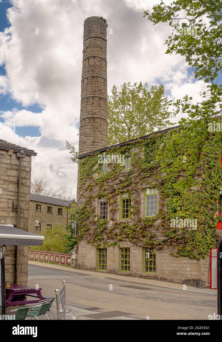 Grade II listed Hebden Bridge Mill and chimney, now converted into a retail outlet. Hebden Bridge, West Yorkshire, UK Stock Photo