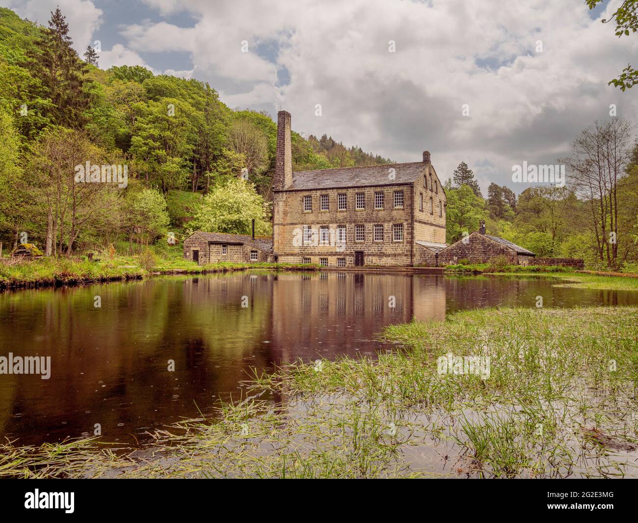 Gibson Mill, a former cotton mill in Hardcastle Crags, wooded Pennine valley in West Yorkshire, England. Now an off-grid visitor attraction. Stock Photo