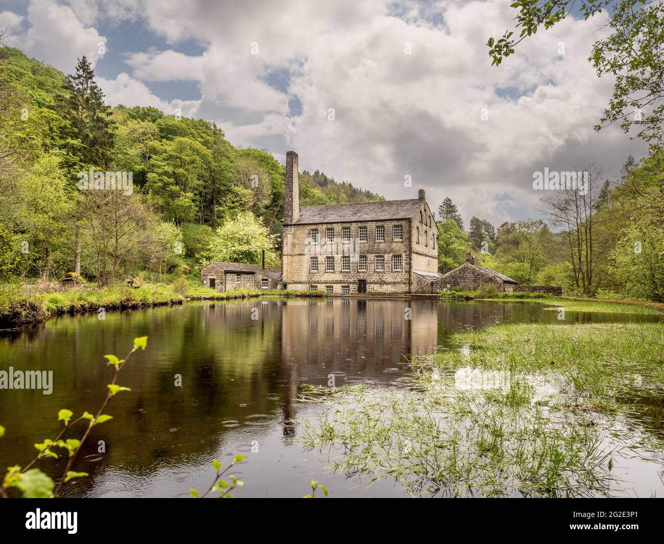 Gibson Mill, a former cotton mill in Hardcastle Crags, wooded Pennine valley in West Yorkshire, England. Now an off-grid visitor attraction. Stock Photo