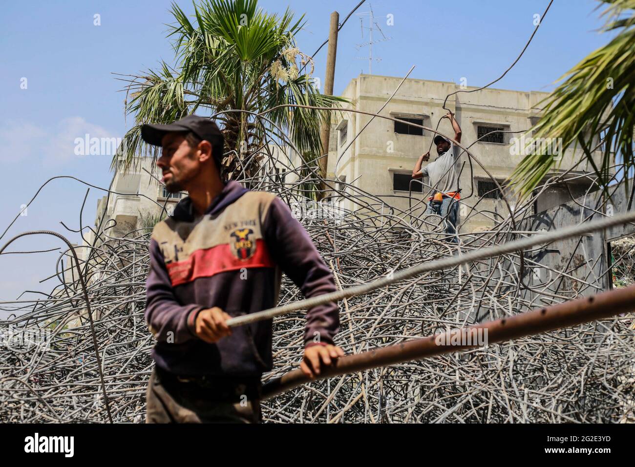 Gaza, Palestine. 10th June, 2021. Palestinian workmen working on the