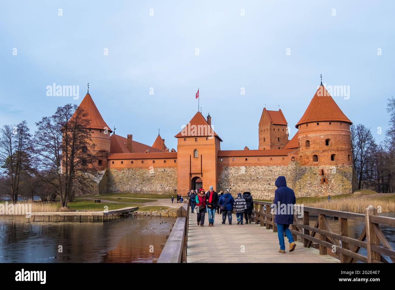 Trakai, Lithuania - February 16, 2020: Landscape of Trakai Island Castle, lake and wooden bridge, Vilnius County, Lithuania Stock Photo
