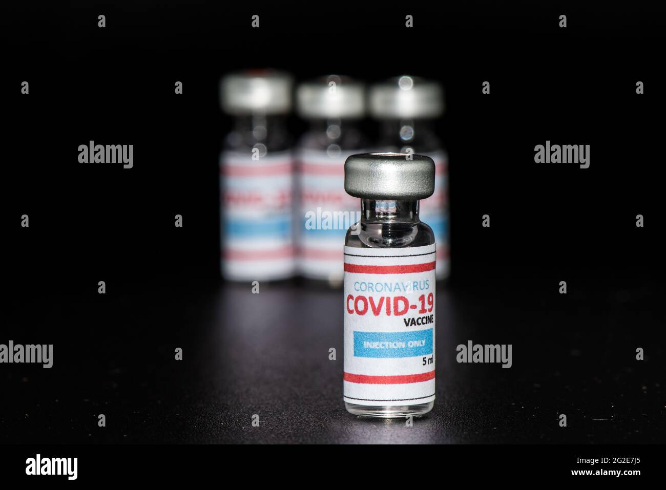 Bottles vial of Covid-19 coronavirus vaccine in a research medical lab ...