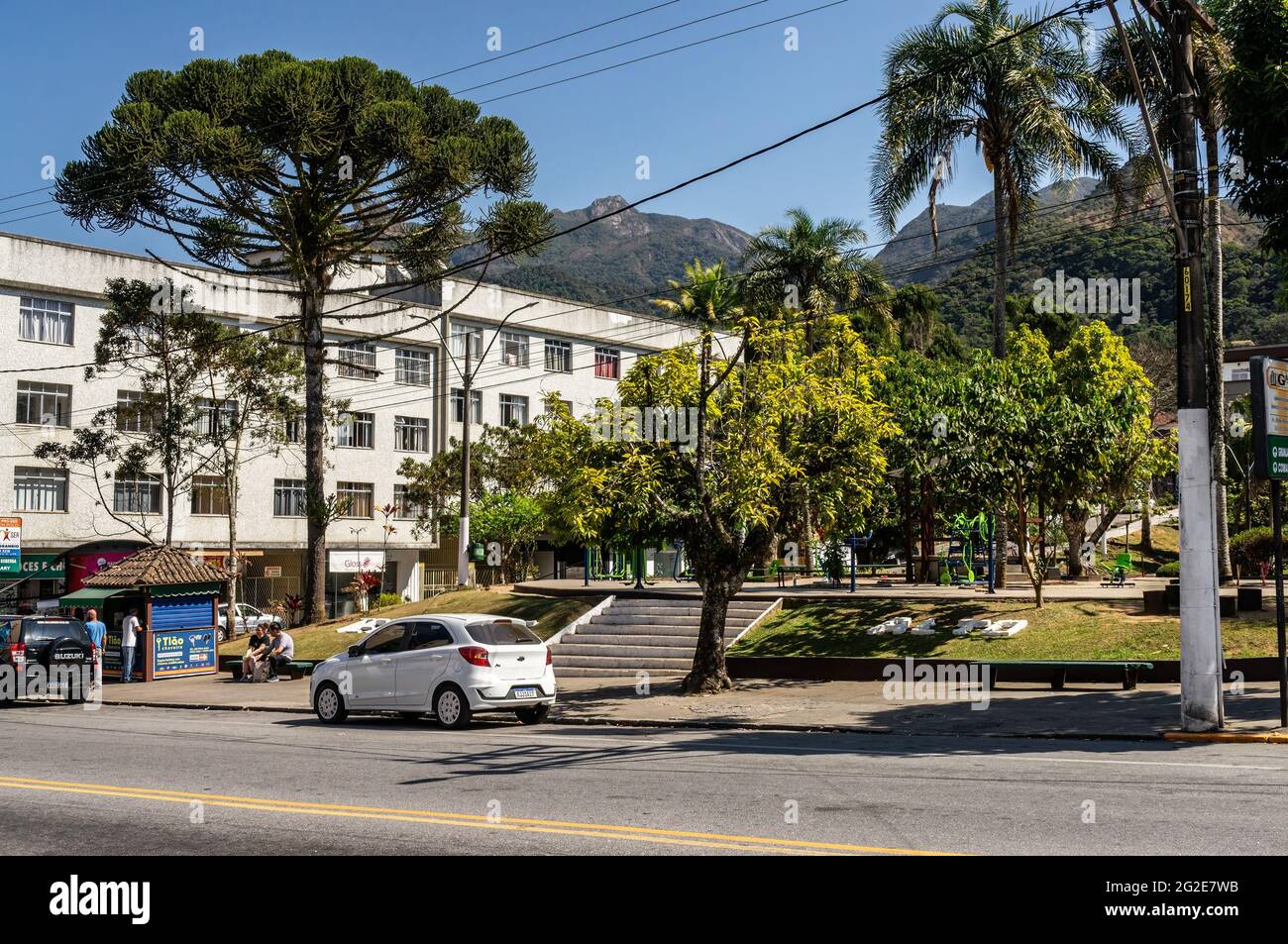 View of Nilo Pecanca square at the side of an apartment building at Oliveira Botelho avenue under sunny clear blue sky day. Stock Photo