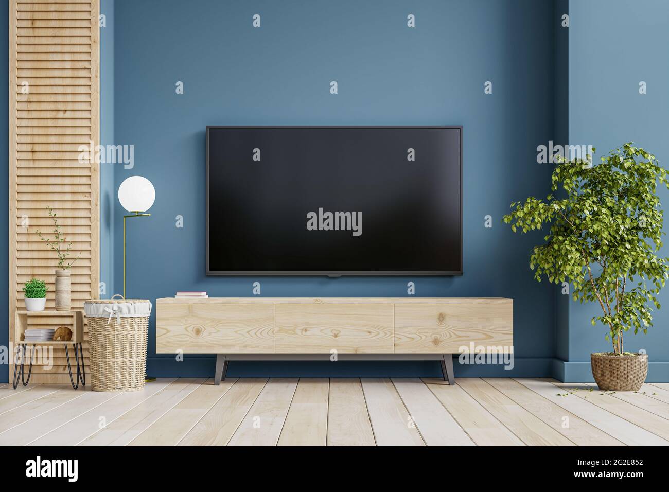 Mockup a TV wall mounted on in a living room room with dark
