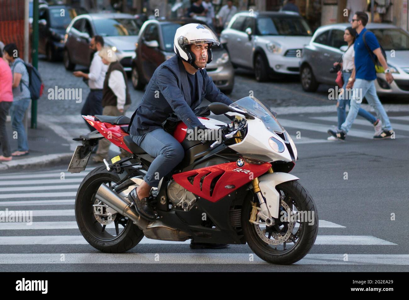 Motorcyclist in Rome Stock Photo