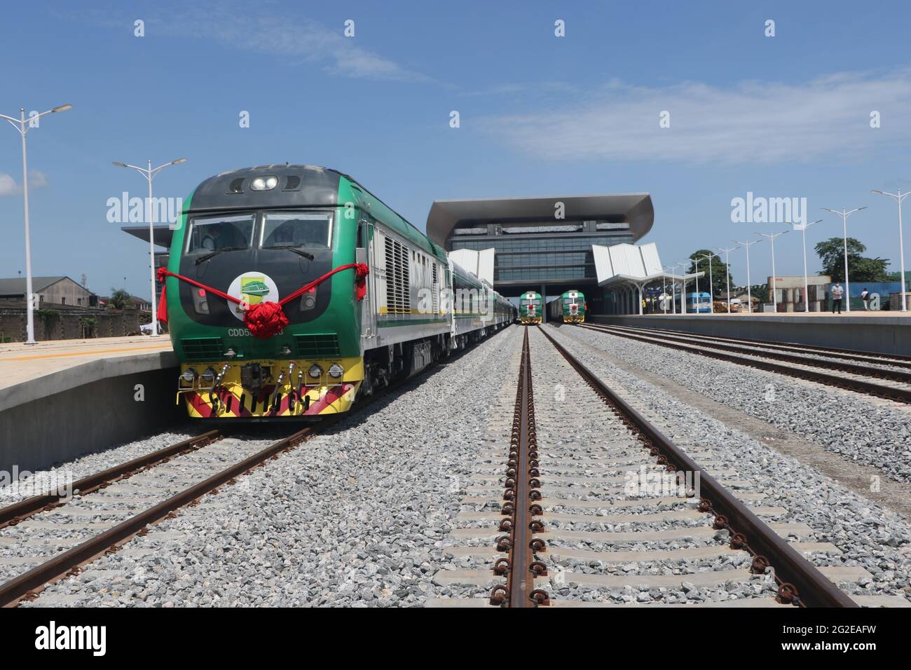 Lagos, Nigeria. 10th June, 2021. Trains park on the track at the Mobolaji Johnson Railway Station of the Lagos-Ibadan railway in Lagos, Nigeria, on June 10, 2021. Nigeria on Thursday officially started the full commercial operation of a China-assisted railway linking the southwestern cities of Lagos and Ibadan, to ease public transportation and fuel goods movement in the west African country.TO GO WITH 'Roundup: Nigeria flags off full commercial operation of China-assisted railway' Credit: Emma Houston/Xinhua/Alamy Live News Stock Photo