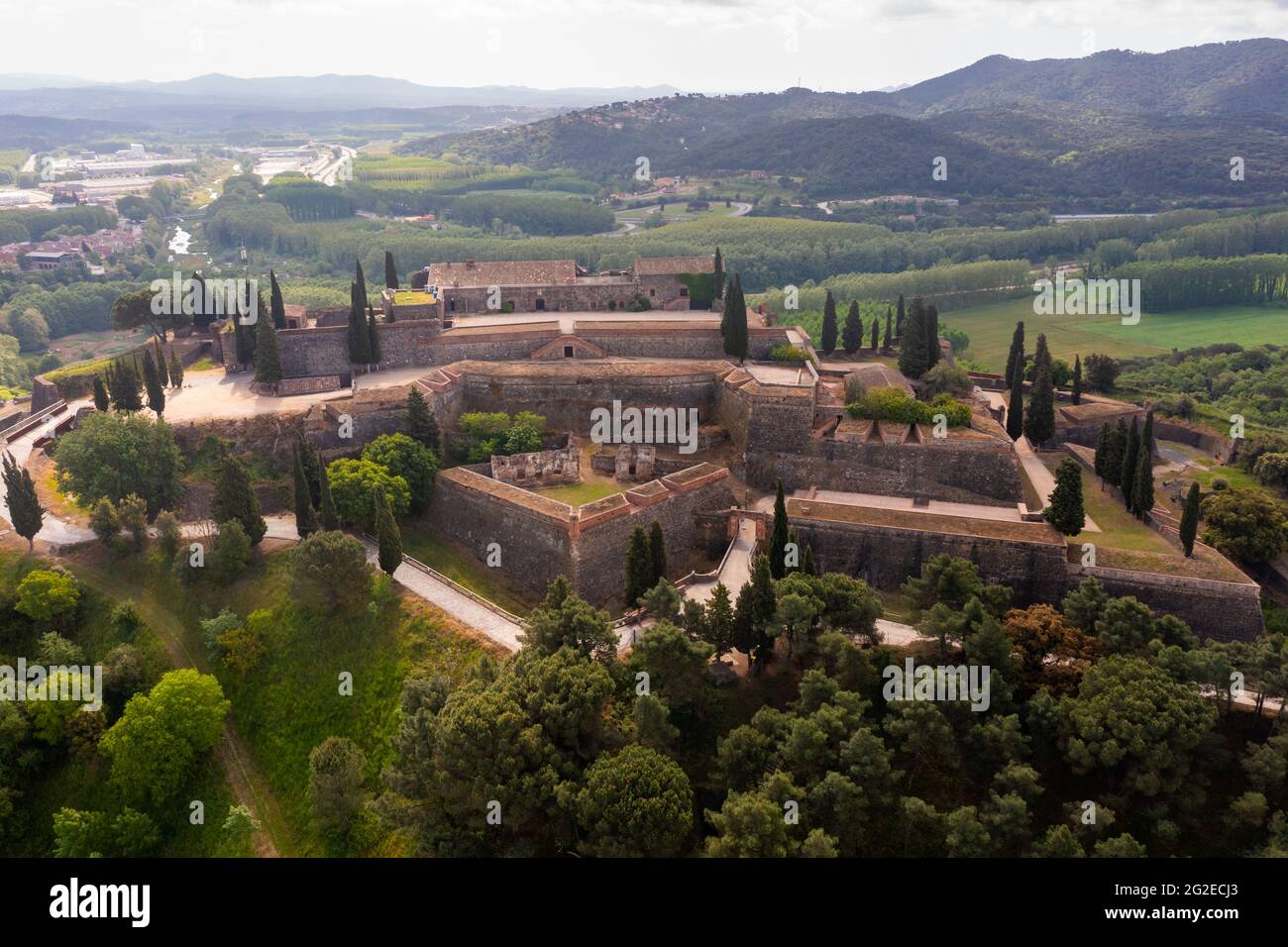 Aerial view of medieval fortress on hill in Hostalric village, Spain Stock Photo