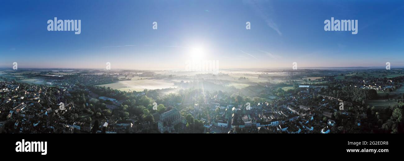 Aerial Panorama of a misty dawn over Malmesbury, Wiltshire Stock Photo